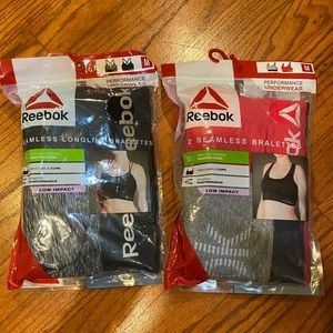Reebok Sports Bras (2) Packs with 2 bras in each.  4 total